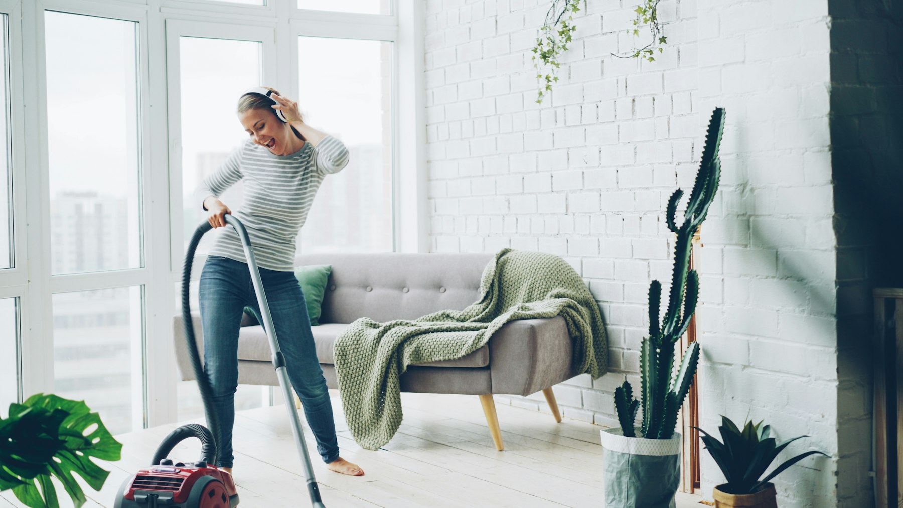Professional cleaning a bright living room