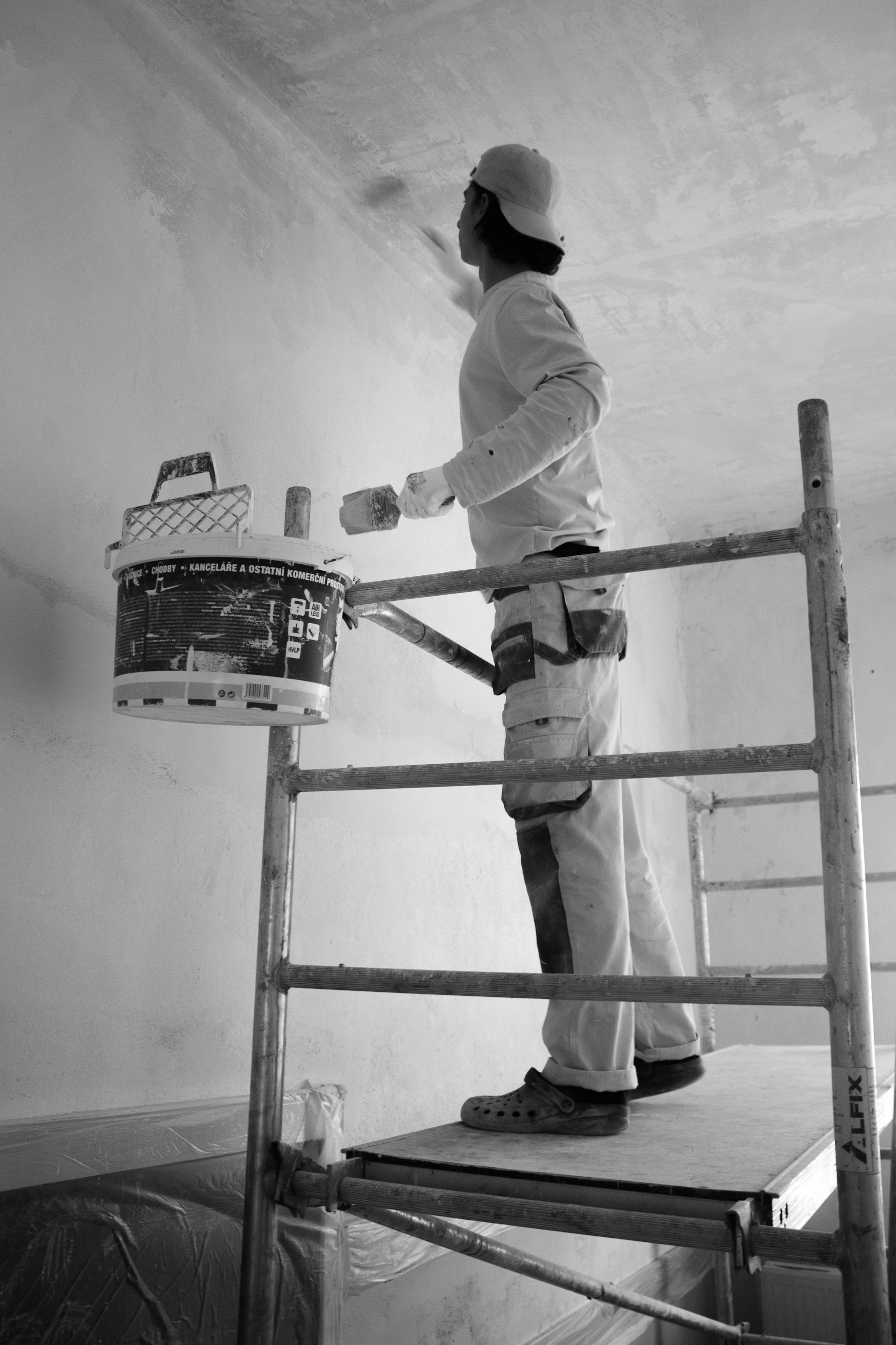 Professional painting an interior wall